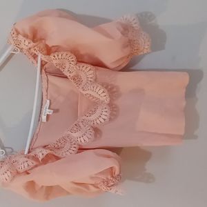 Pastel pink cotton top.
